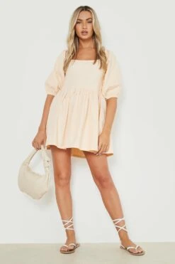 Vestito Grembiule In Denim Raccolto Con Laccetti Sul Retro